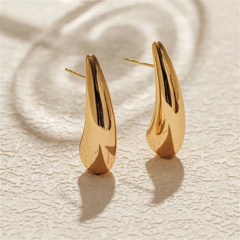 Sleek golden drop studs